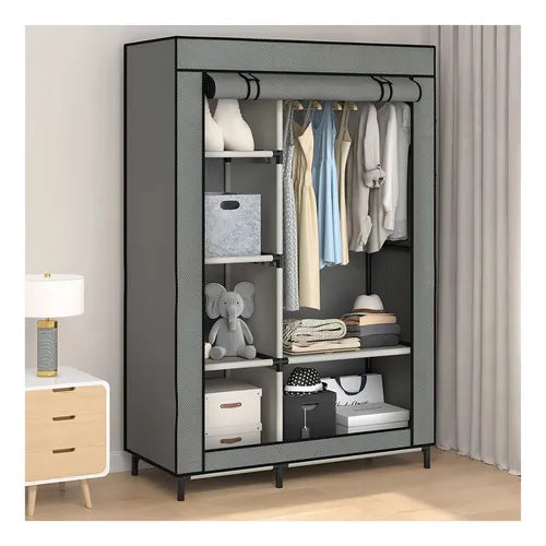 https://cdn.shopify.com/s/files/1/0661/2729/8714/files/closet-armable-portatil-entrepanos-tela-ecologica-gris2.webp?v=1753666751