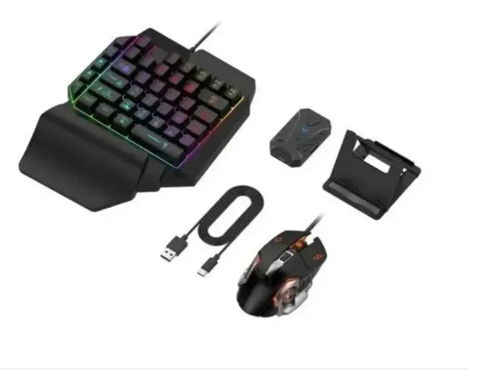 https://cdn.shopify.com/s/files/1/0661/2729/8714/files/combo-gamer-celular-bluetooth-4-in-1-mobile-pack-mouse-teclado2.webp?v=1753666727