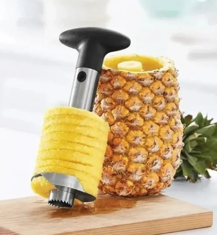 https://cdn.shopify.com/s/files/1/0661/2729/8714/files/pelador-de-pina-descorazonador-rebanador-acero-inoxidable2.webp?v=1753666733